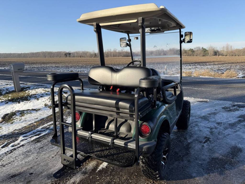 Lifted green 2009 Yamaha G29 Drive golf cart sold by Rugged Buggies, Byron, MI