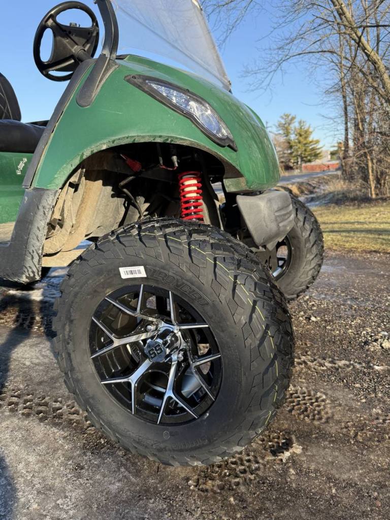 Lifted green 2009 Yamaha G29 Drive golf cart sold by Rugged Buggies, Byron, MI