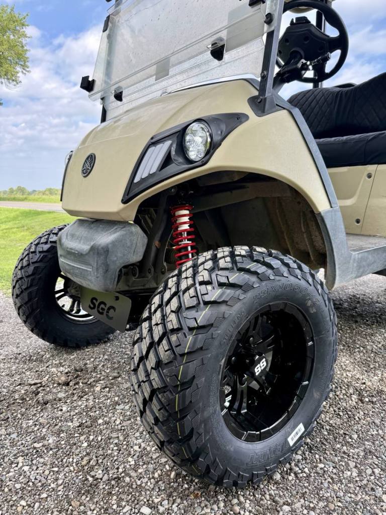 Lifted tan 2020 Yamaha Drive2 EFI golf cart sold by Rugged Buggies, Byron, MI