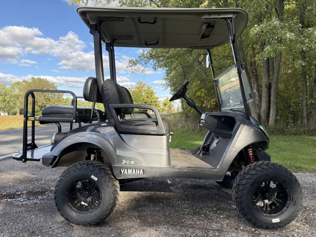 Lifted carbon 2021 Yamaha Drive2 EFI golf cart sold by Rugged Buggies, Byron, MI