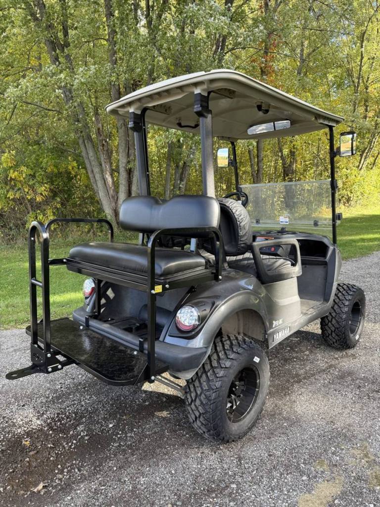 Lifted carbon 2021 Yamaha Drive2 EFI golf cart sold by Rugged Buggies, Byron, MI