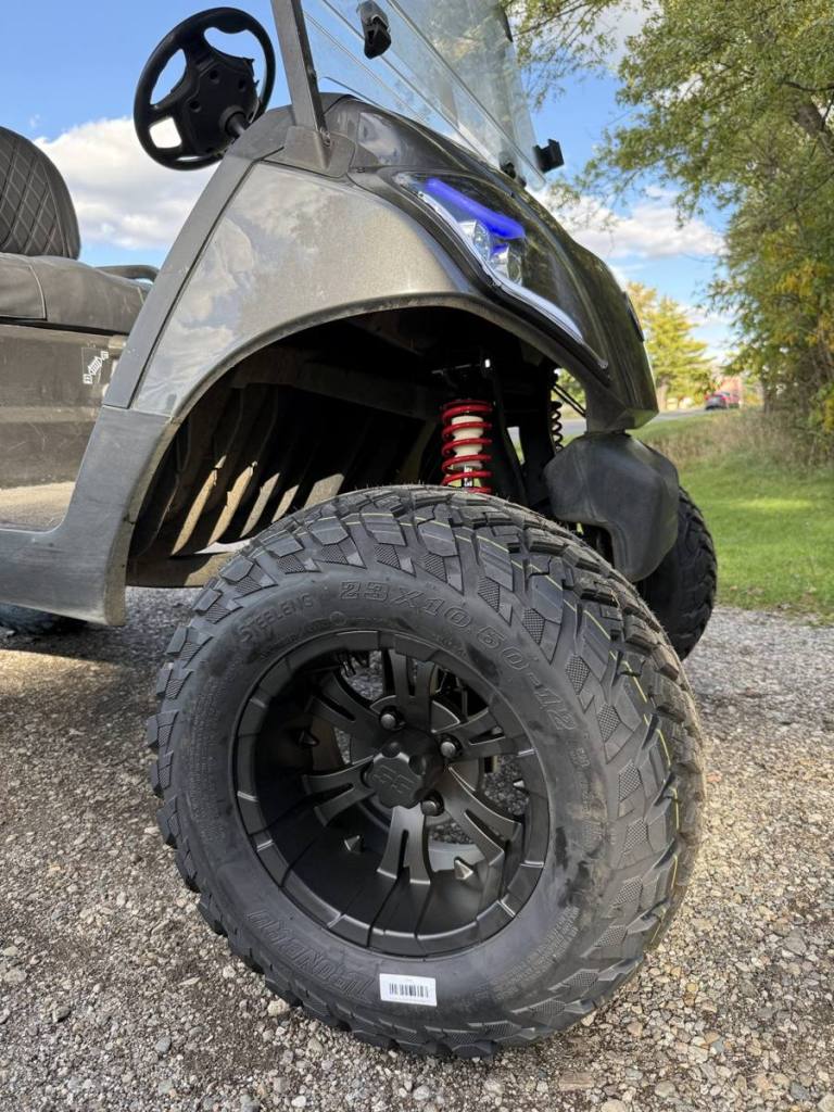 Lifted carbon 2021 Yamaha Drive2 EFI golf cart sold by Rugged Buggies, Byron, MI