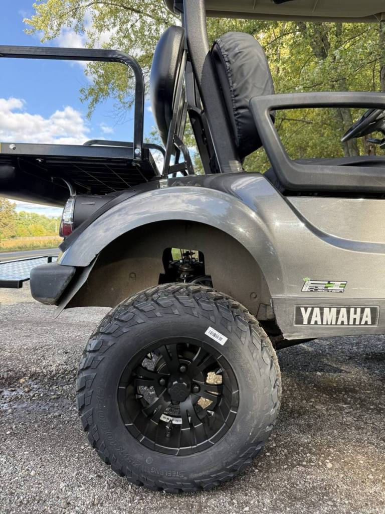 Lifted carbon 2021 Yamaha Drive2 EFI golf cart sold by Rugged Buggies, Byron, MI