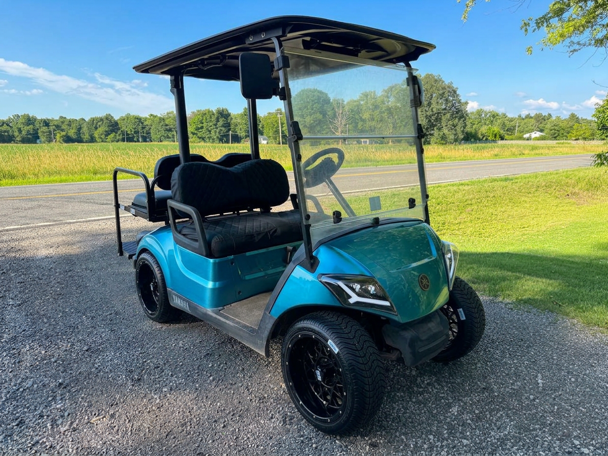 yamaha-drive2-efi-quietech-blue-sold-5 Blue golf cart with flip-down windshield, mirrors and seat covers, golf cart parts in Byron, MI