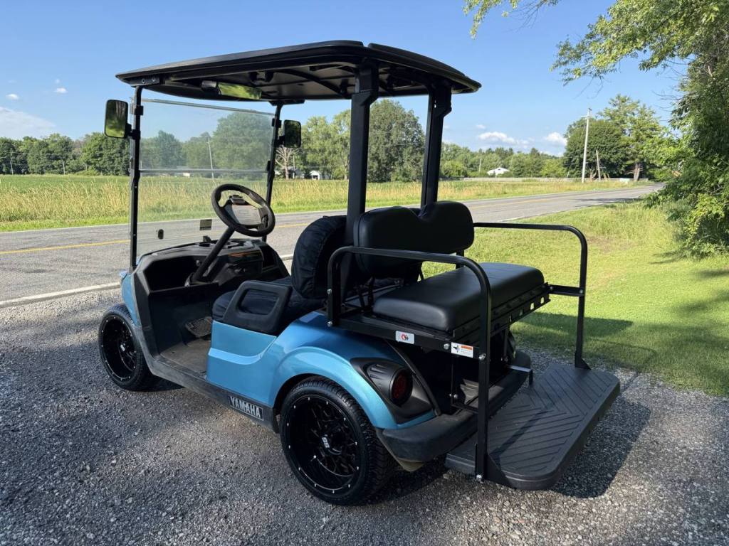 Custom metallic blue 2019 Yamaha Drive2 EFI QuieTech golf cart sold by Rugged Buggies, Byron, MI